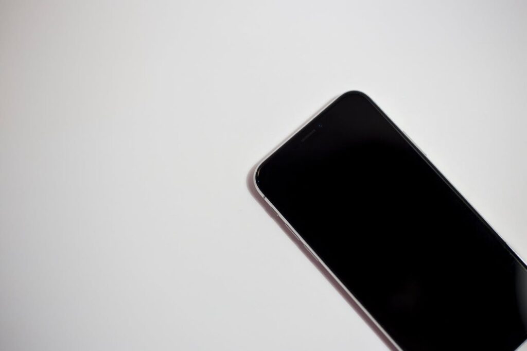 why is my phone working but the screen is black iphone