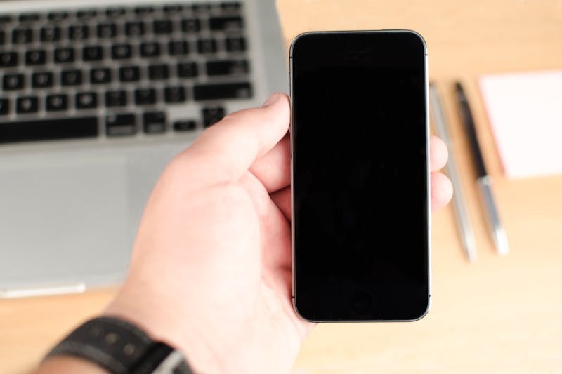 why is my phone working but the screen is black iphone in 2026